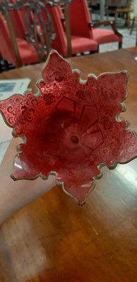 Lot 136 - Bohemian overlaid ruby glass flute and enamelled amber glass flask.